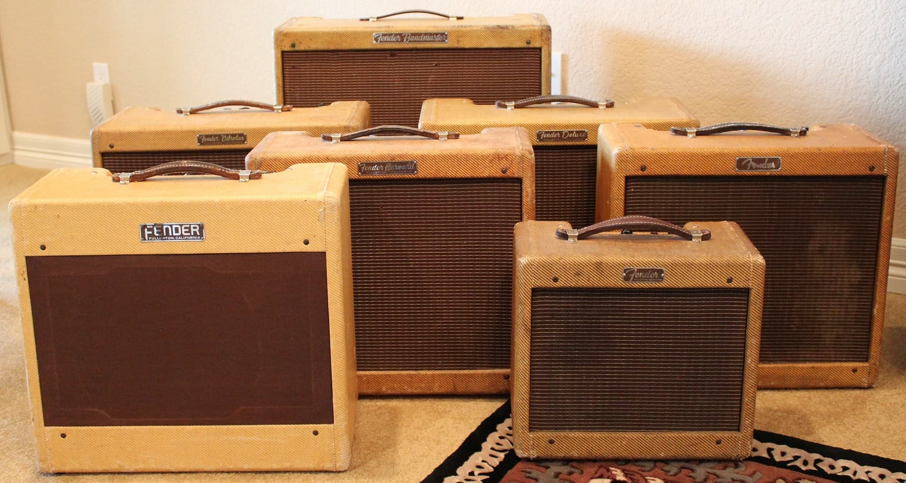 A collection of vintage Fender amplifiers.
